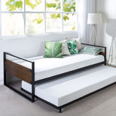 2. A stylish day bed with a plush mattress and an assortment of colorful pillows for added comfort.